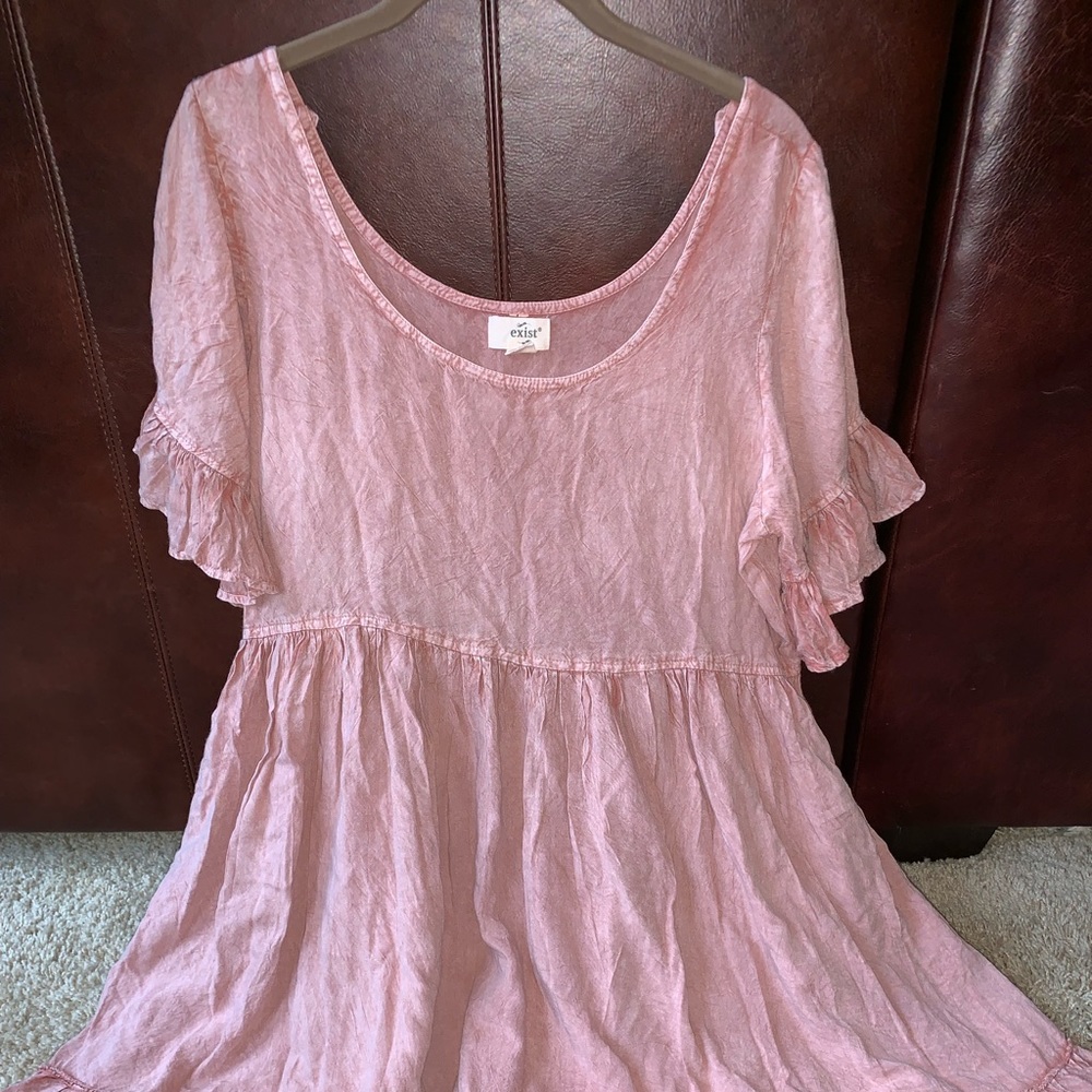 Exist, pale pink dress with ruffles and string.